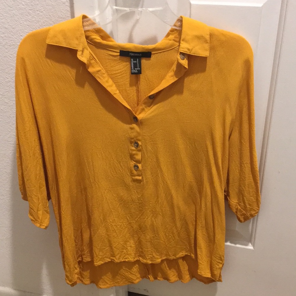 Mustard-colored blouse. Only worn once! Size S